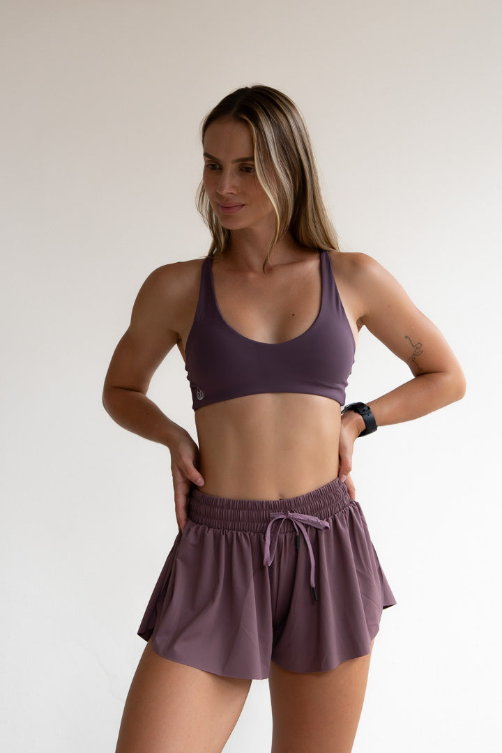 Top púrpura running
